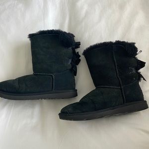Black Ugg boots with ribbon in back